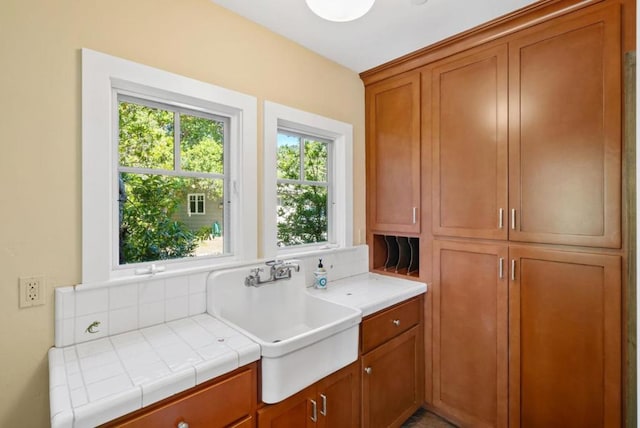 kitchen with sink and tile counters