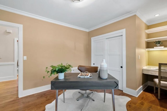 office space with crown molding and wood-type flooring