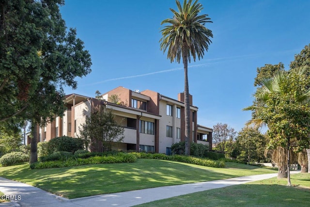 exterior space featuring a lawn