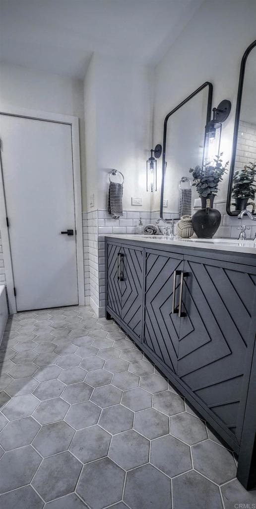 bathroom featuring vanity and tile patterned flooring