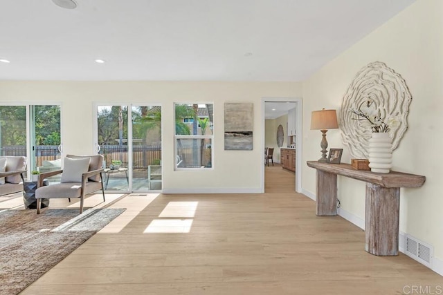 doorway to outside with light hardwood / wood-style floors