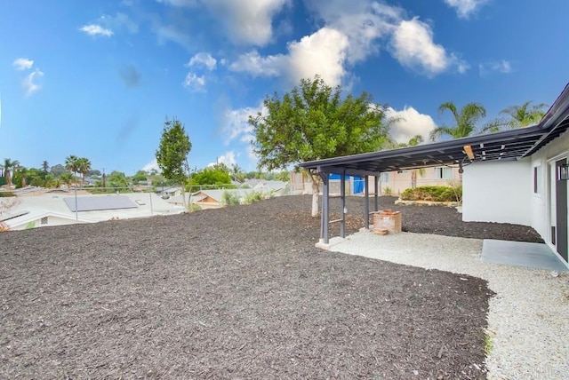 view of yard featuring a carport