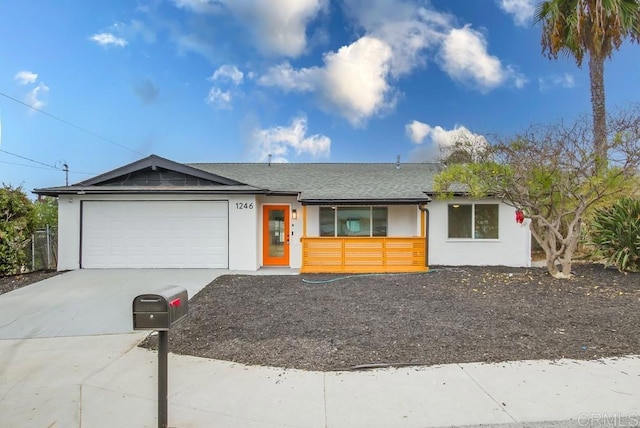 ranch-style home with a garage