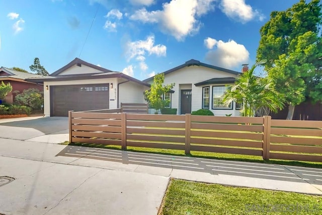 single story home with a garage