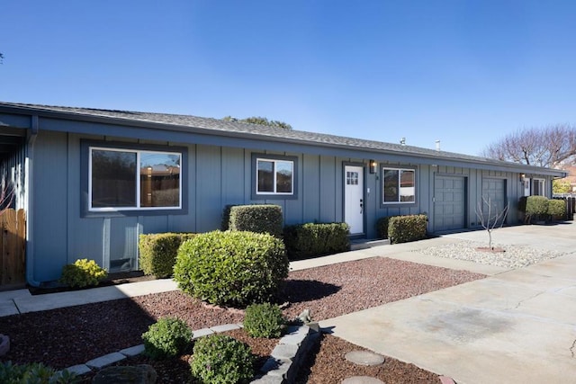 ranch-style home featuring a garage