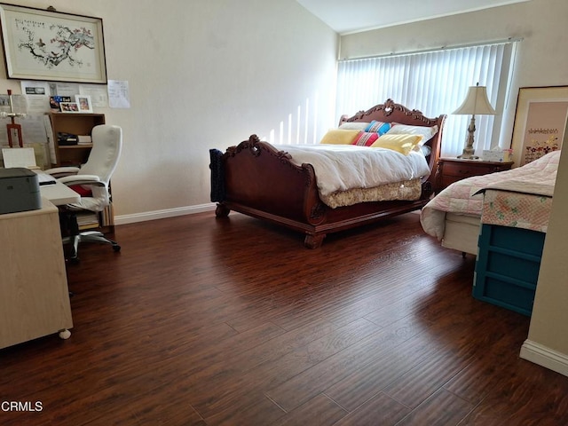 695 County Square Dr Unit 13, Ventura, CA 93003 - bedroom with dark hardwood / wood-style floors