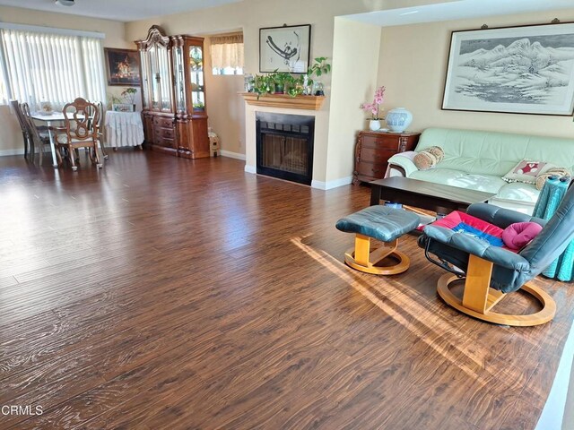 695 County Square Dr Unit 13, Ventura, CA 93003 - living room with dark hardwood / wood-style flooring