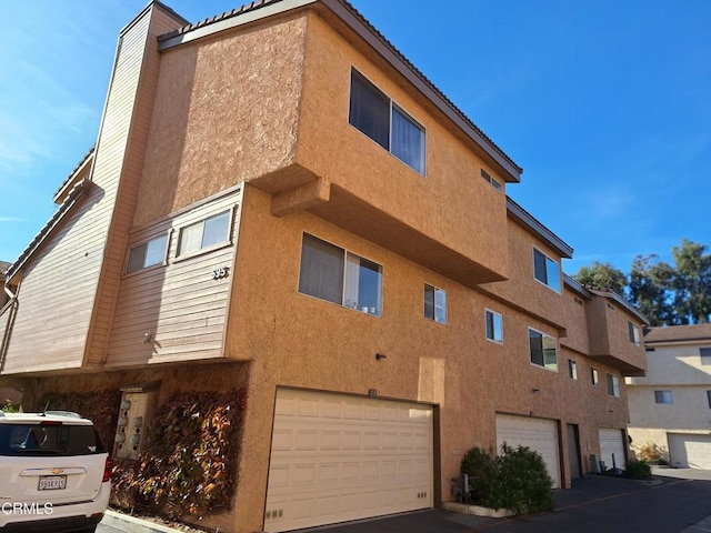 view of building exterior with a garage