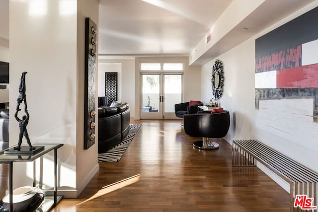 hall with french doors and dark hardwood / wood-style flooring