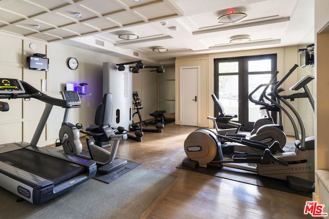 workout room with french doors and dark hardwood / wood-style floors