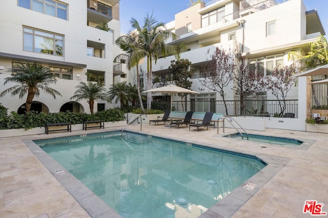 view of pool with a patio area