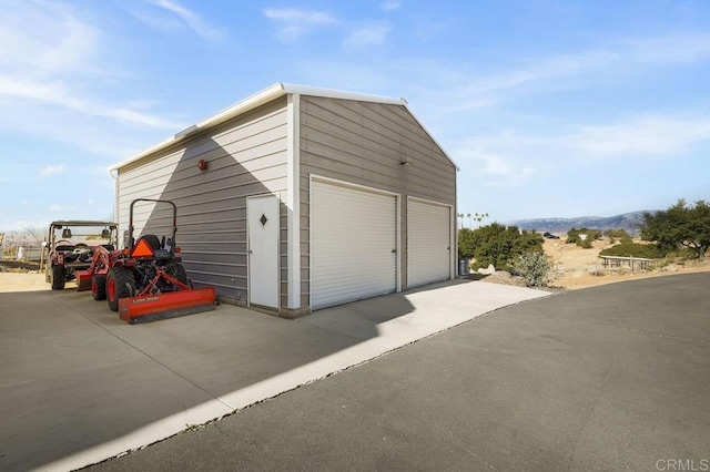 garage featuring a mountain view