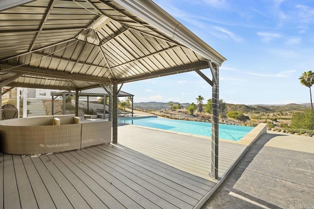 exterior space featuring a gazebo and a mountain view