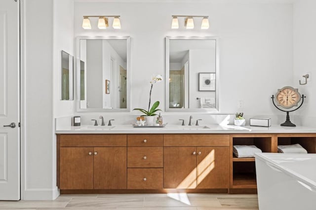 bathroom featuring vanity and a bathtub