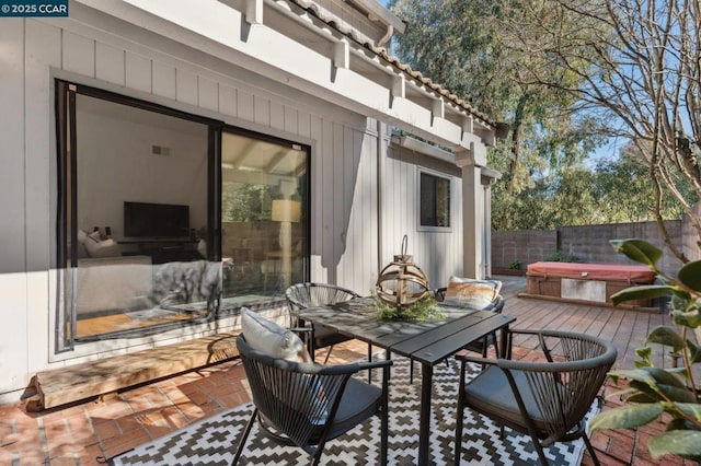 view of patio with a hot tub