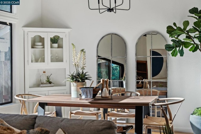 dining room featuring a notable chandelier