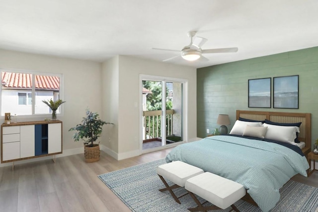 bedroom with ceiling fan, access to exterior, and light hardwood / wood-style floors