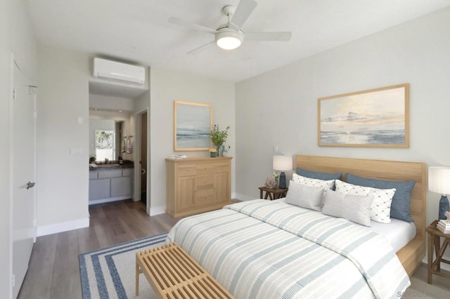 bedroom featuring ceiling fan, an AC wall unit, and dark hardwood / wood-style flooring