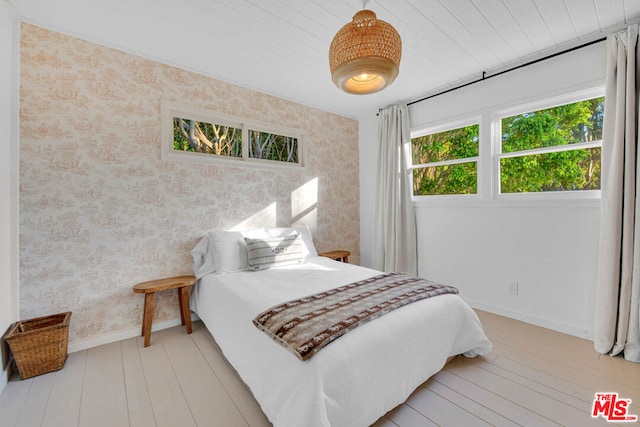 bedroom featuring light wood-type flooring