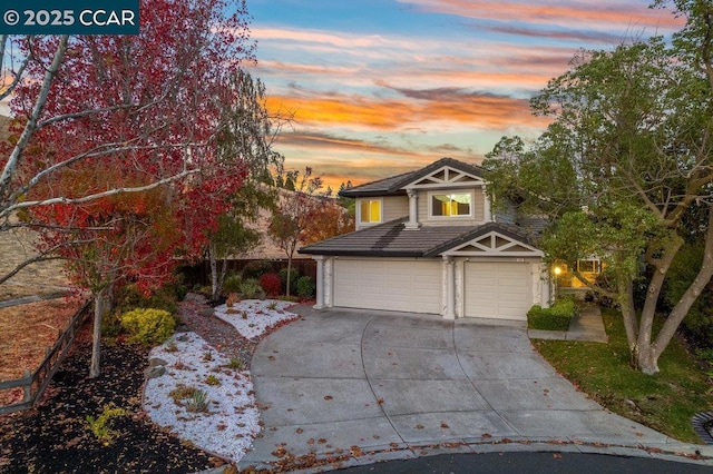 view of front of property with a garage