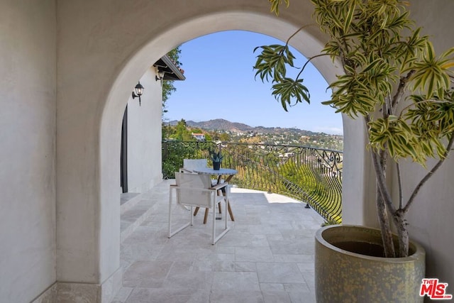 view of patio with a mountain view