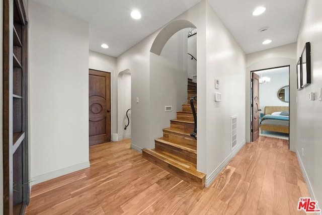 entrance foyer featuring light wood-type flooring