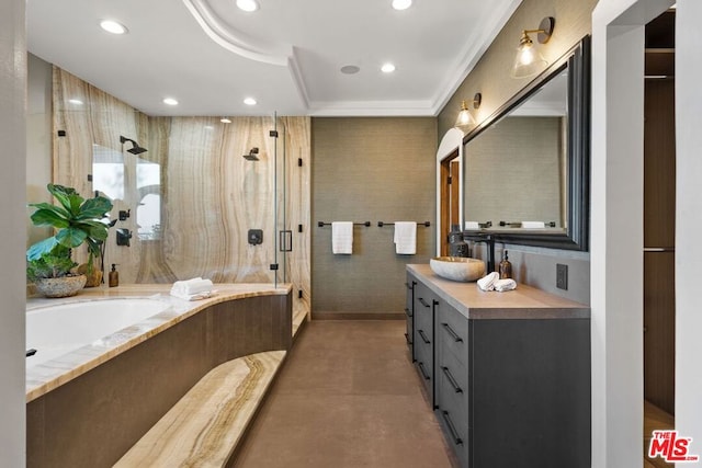 bathroom with vanity, concrete floors, a tray ceiling, independent shower and bath, and ornamental molding