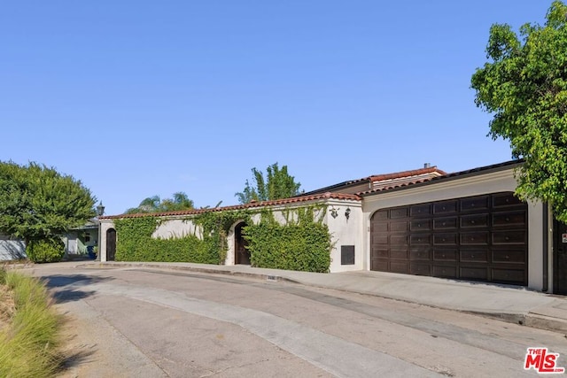 view of front of property with a garage