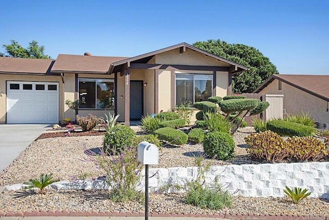 ranch-style house featuring a garage