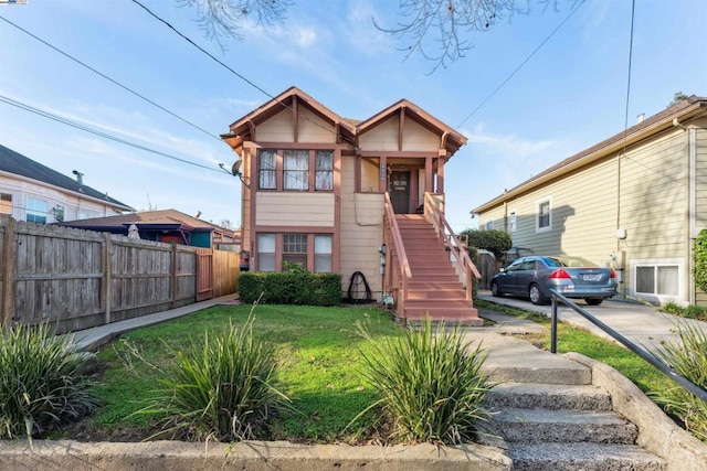 view of front of home with a front lawn