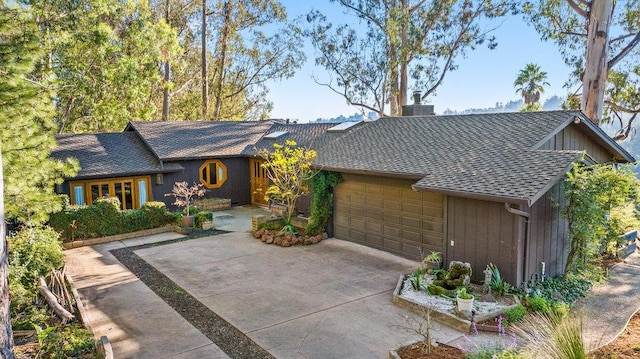 ranch-style home featuring a garage