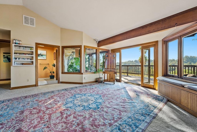 sunroom with vaulted ceiling with beams