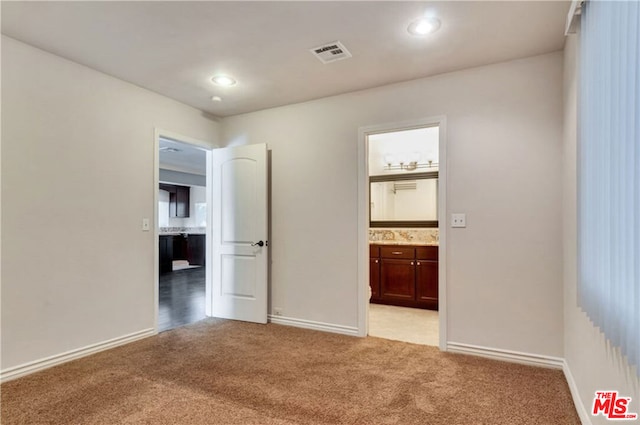 interior space with light colored carpet