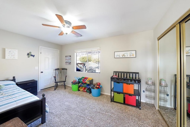 carpeted bedroom featuring ceiling fan