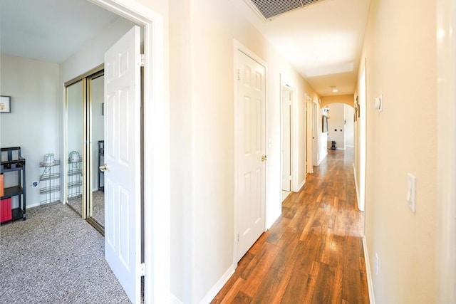 hallway featuring dark hardwood / wood-style floors