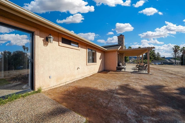 exterior space featuring a patio area