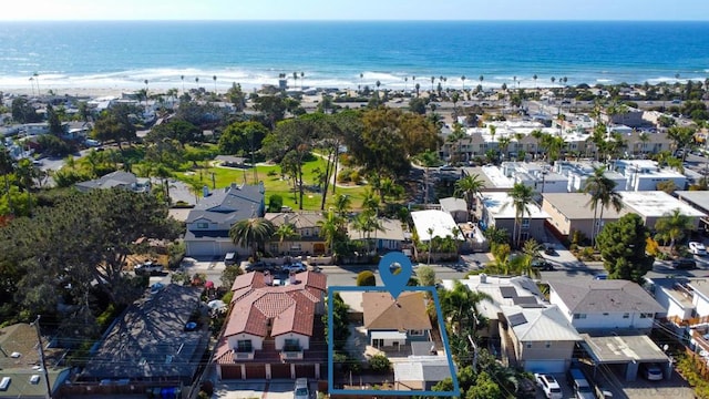 bird's eye view with a beach view and a water view