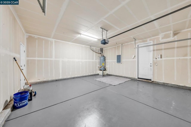 garage featuring water heater, a garage door opener, and electric panel