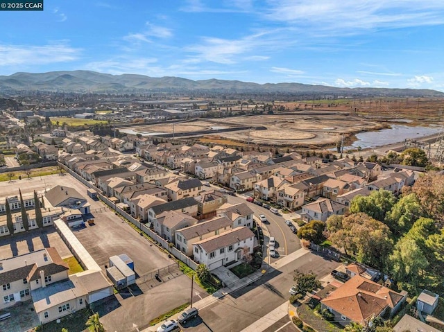 bird's eye view with a mountain view