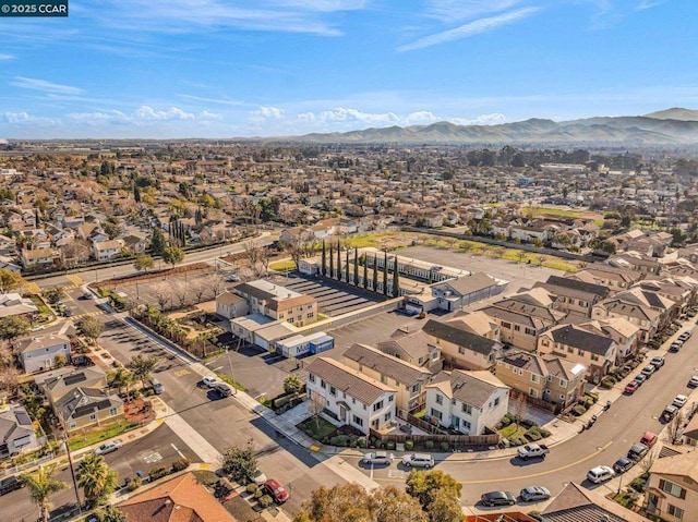 bird's eye view with a mountain view