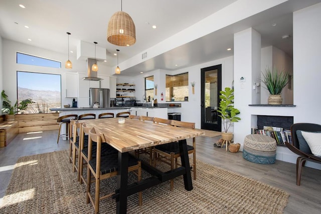 dining area featuring wood-type flooring