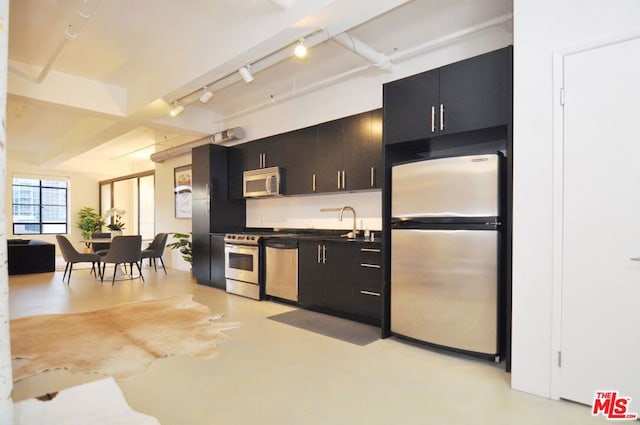 kitchen with sink and stainless steel appliances