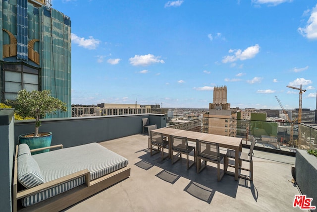 view of patio / terrace with a balcony