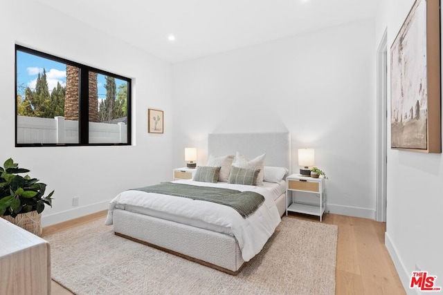 bedroom featuring hardwood / wood-style flooring