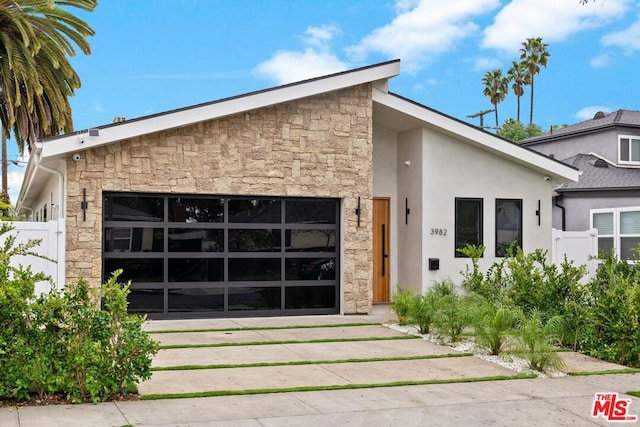 modern home featuring a garage