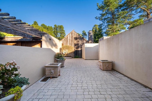 view of patio / terrace featuring a pergola