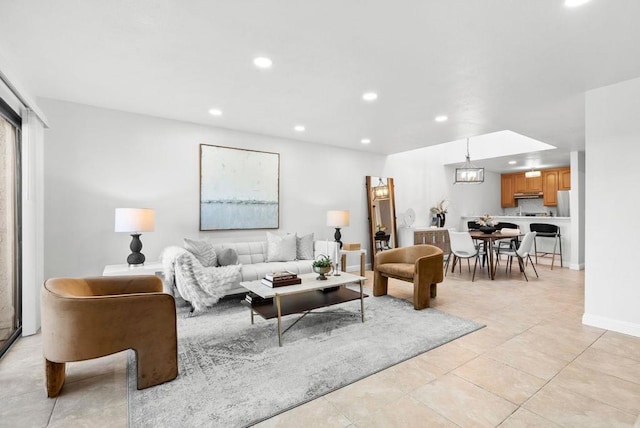 living room featuring light tile patterned floors