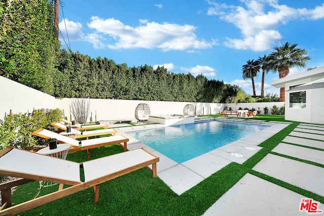 view of pool with a patio area