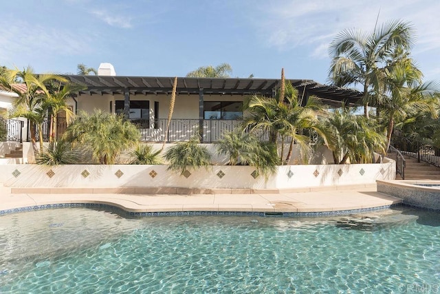 view of pool featuring a fenced in pool and fence