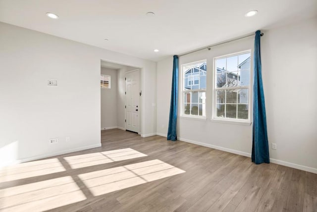 empty room featuring light hardwood / wood-style floors